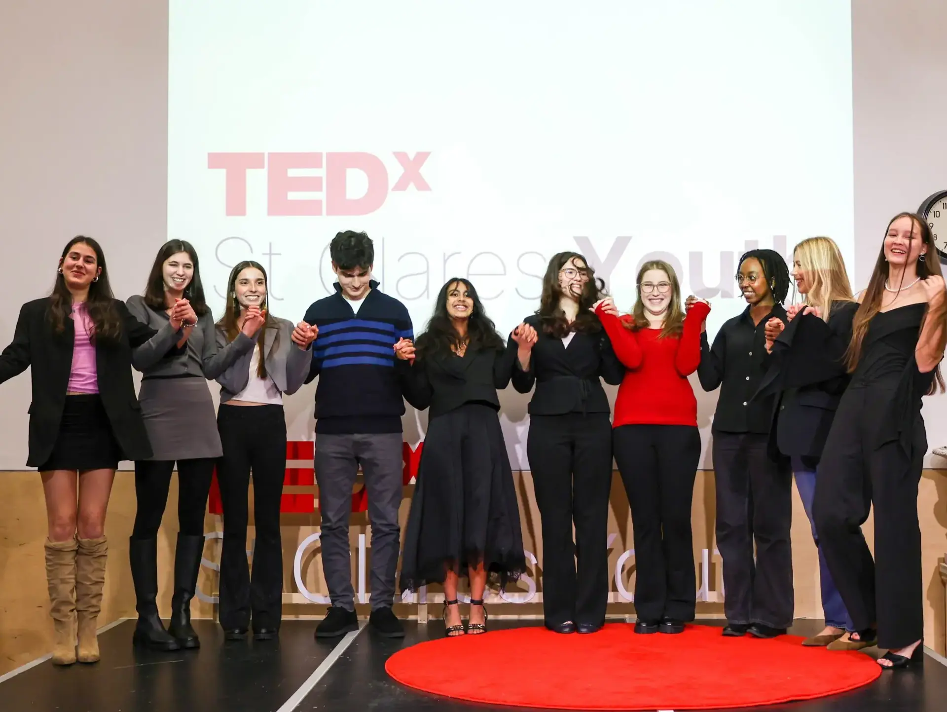 TEDx speakers standing on stage