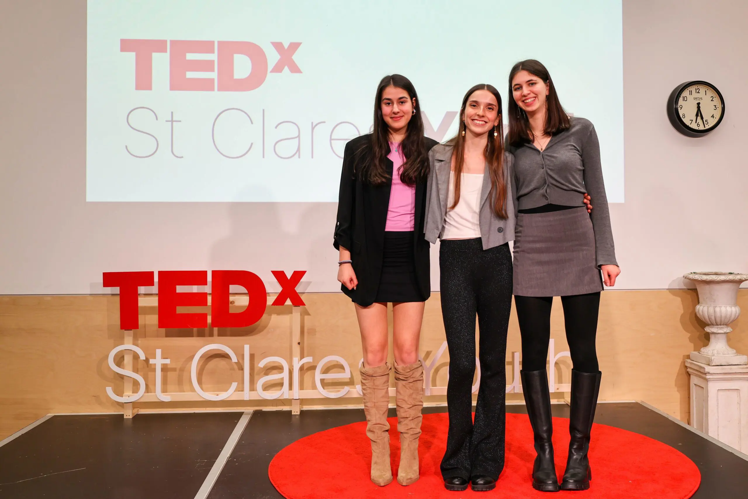 TEDx speakers standing on stage
