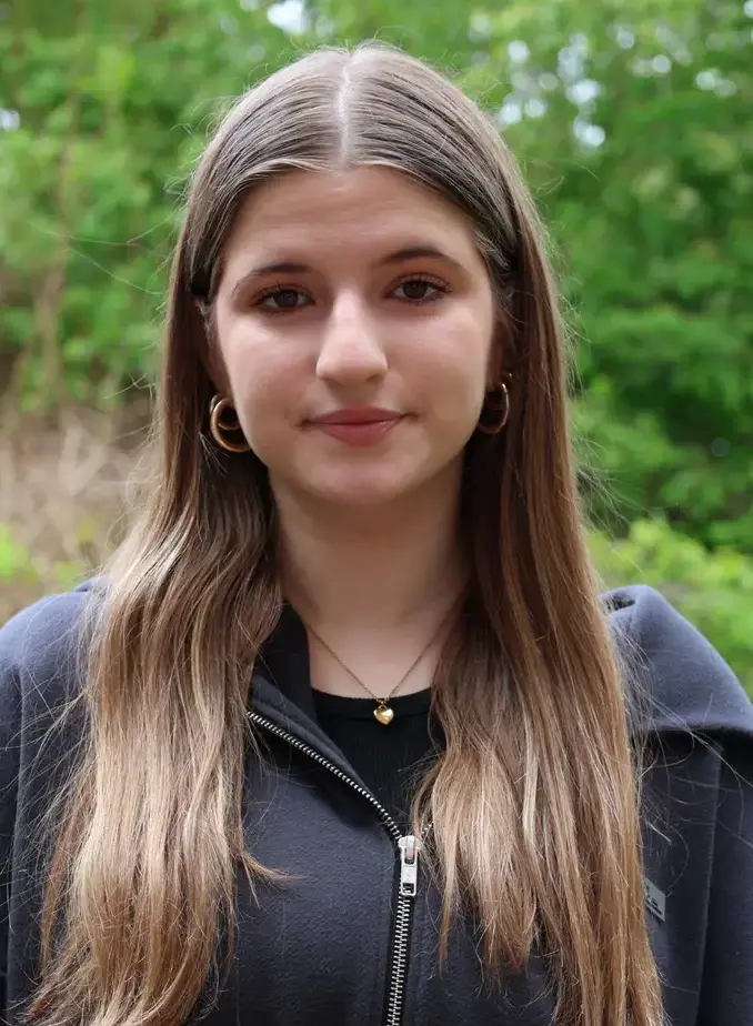 Female student from Ukraine smiling at camera