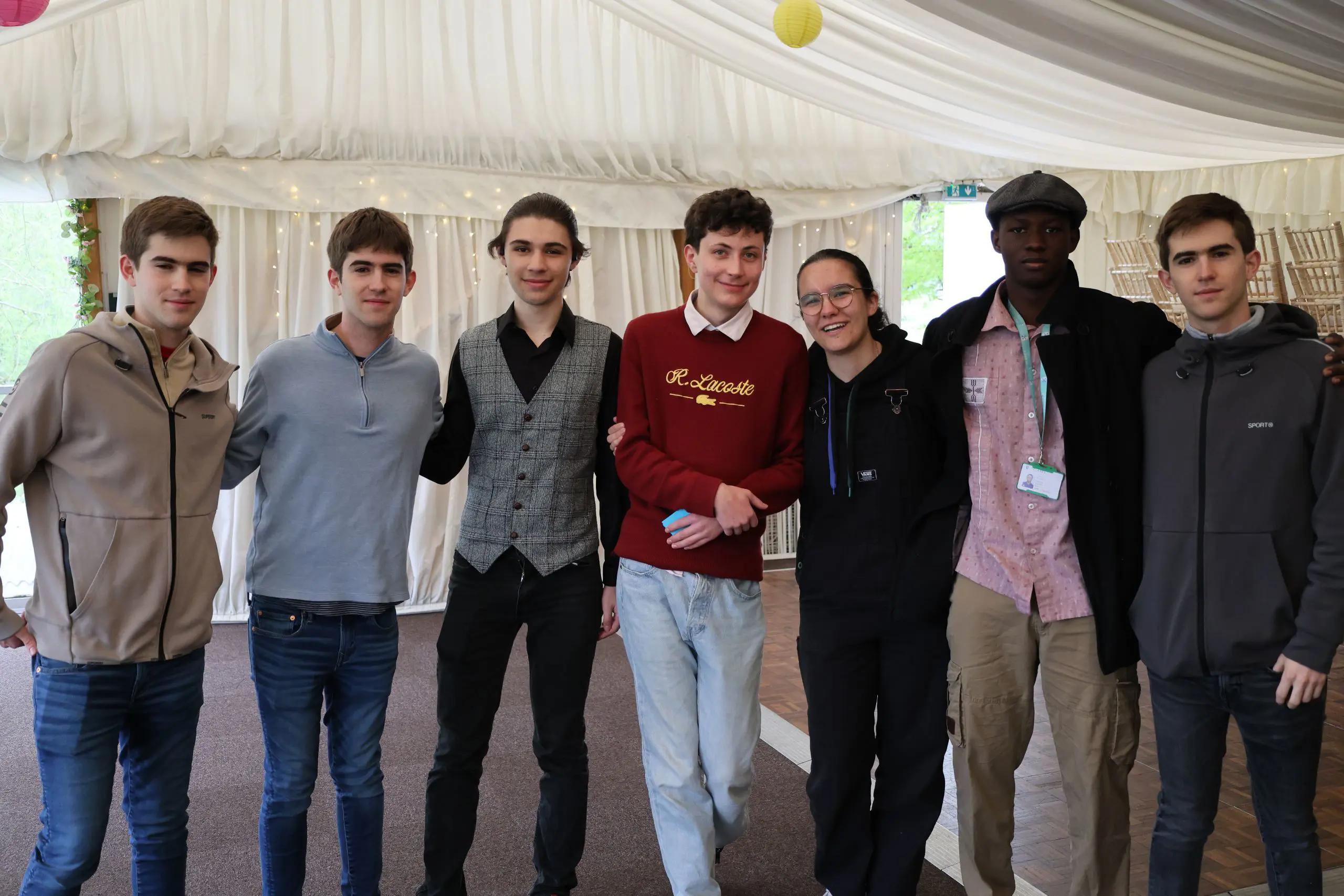 Chamine and friends at a college event