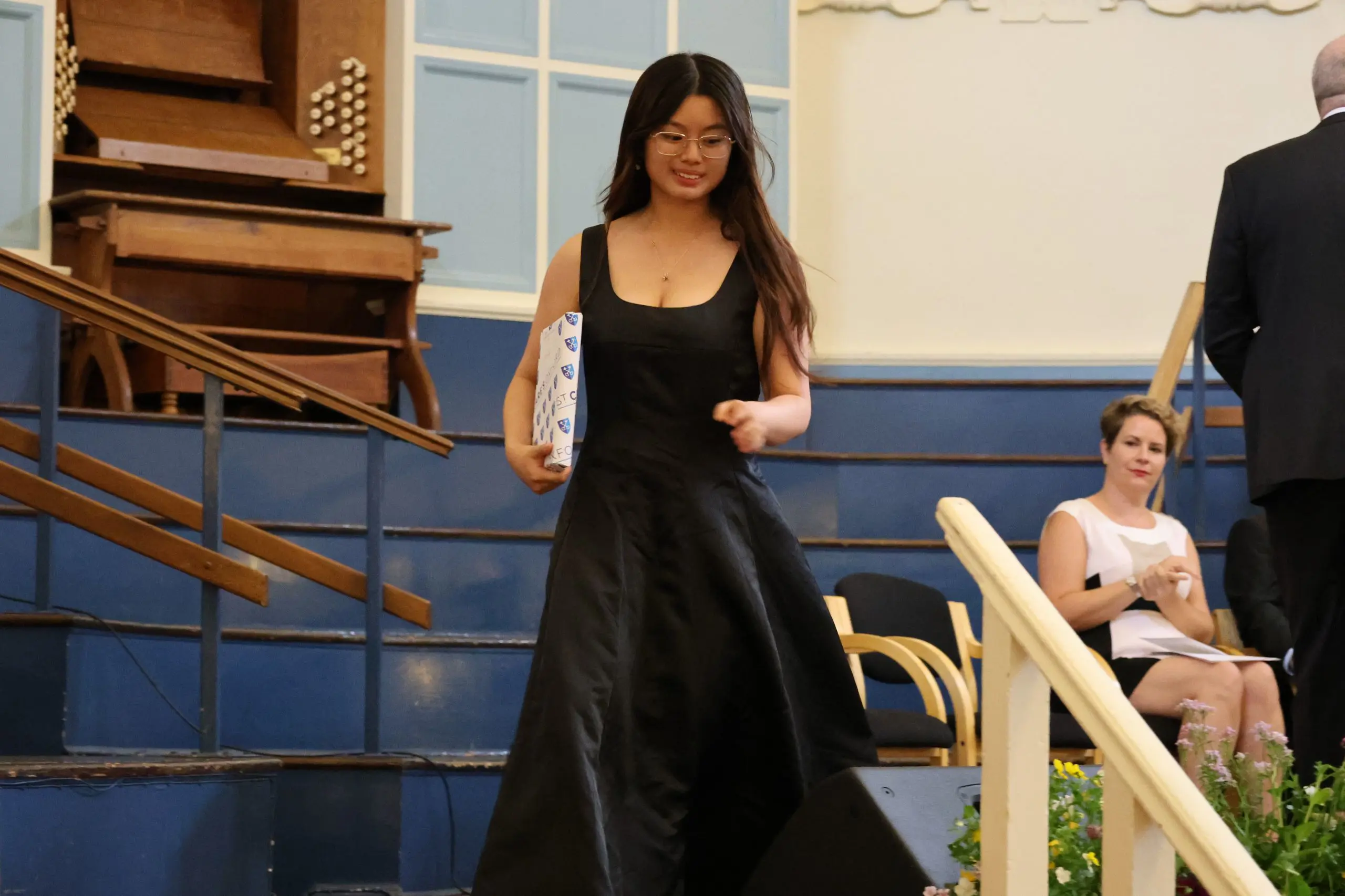 Sheeta collecting an award at Graduation
