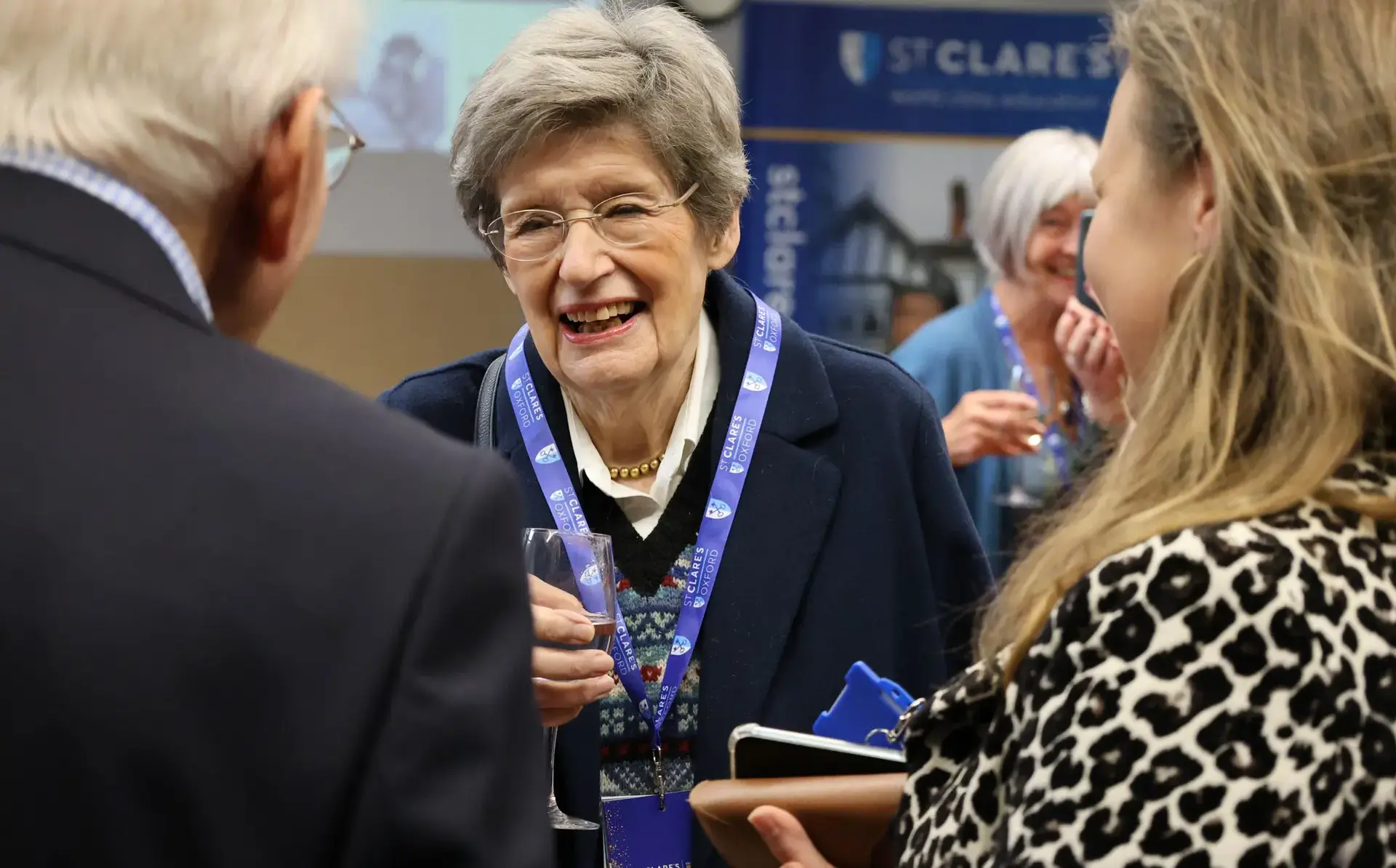 Alumni chatting at event