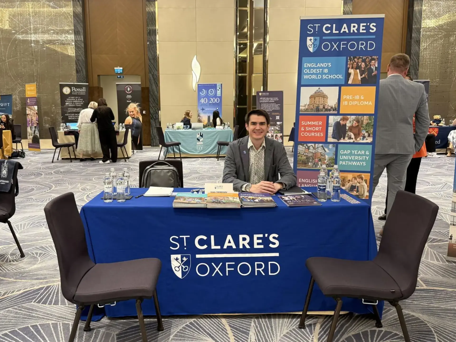 St Clare's agent staffing table at event