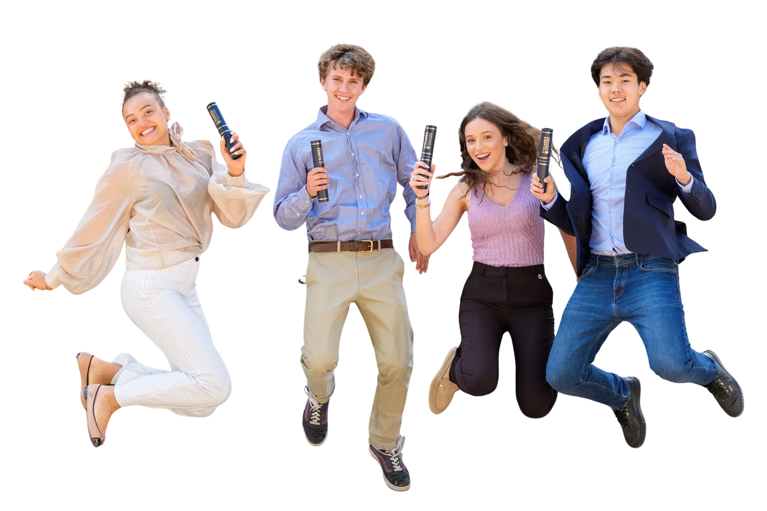 Graduating students jumping while holding their diplomas and smiling