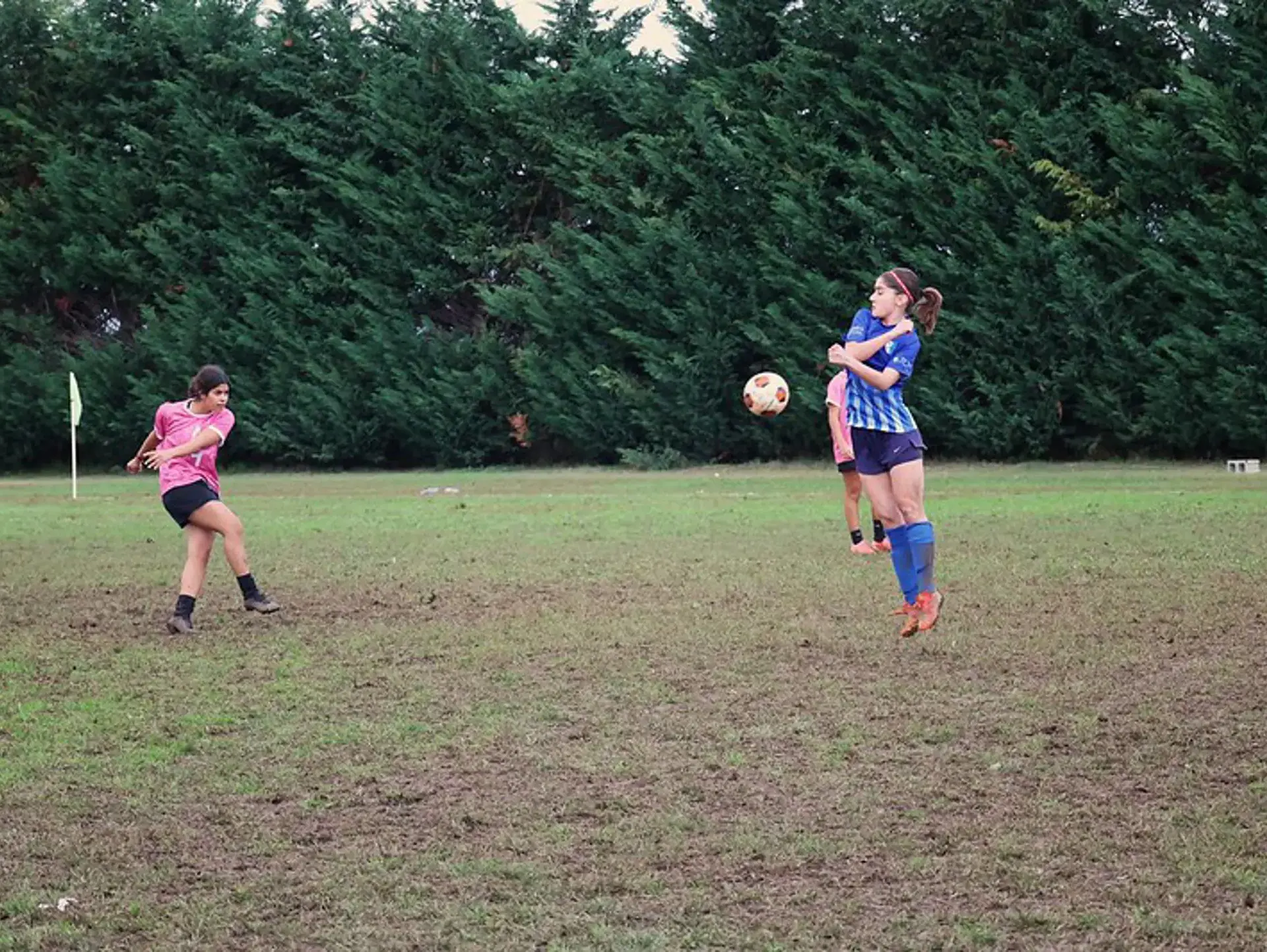 Student athletes playing football