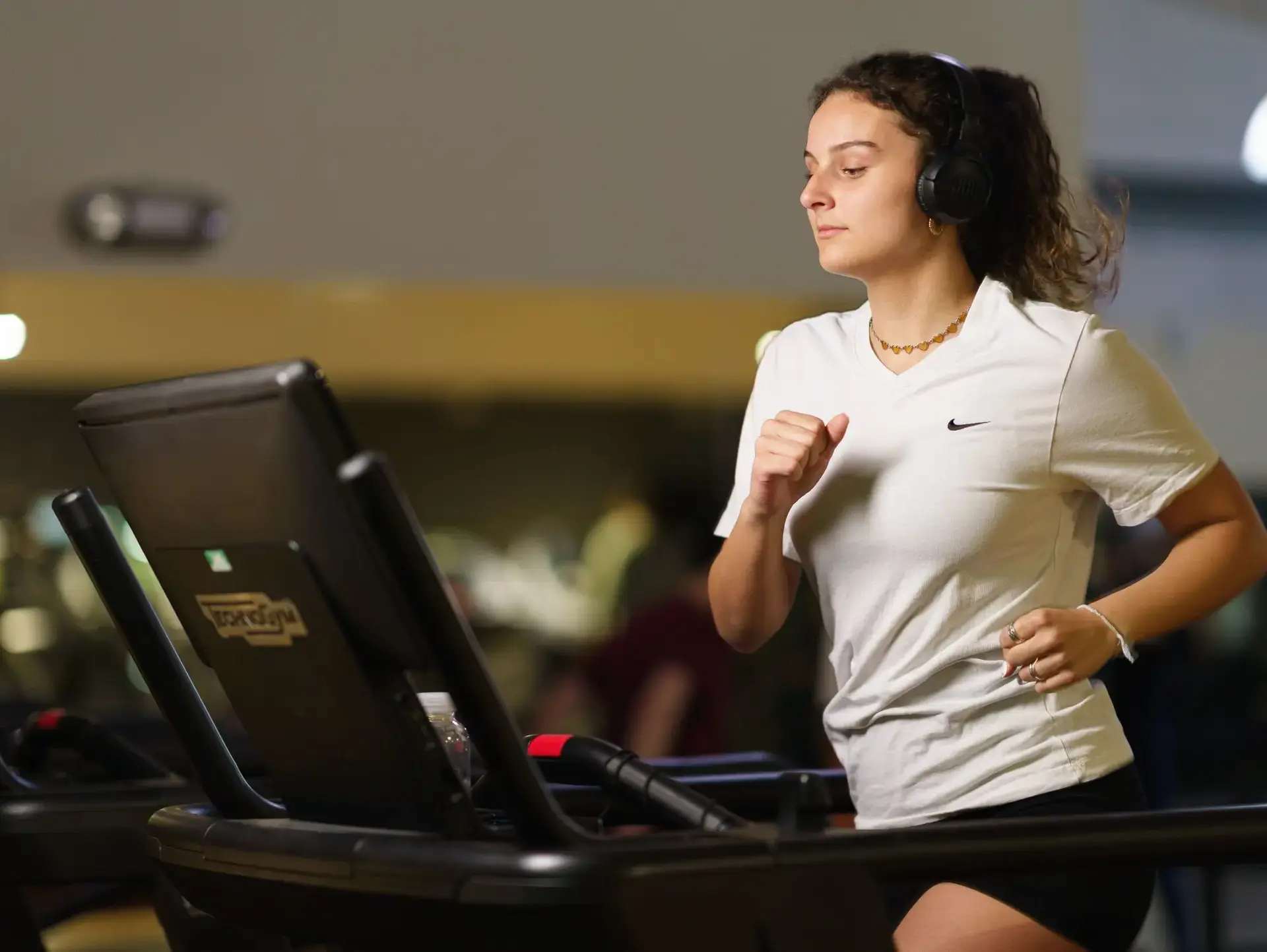 Student running on treadmill