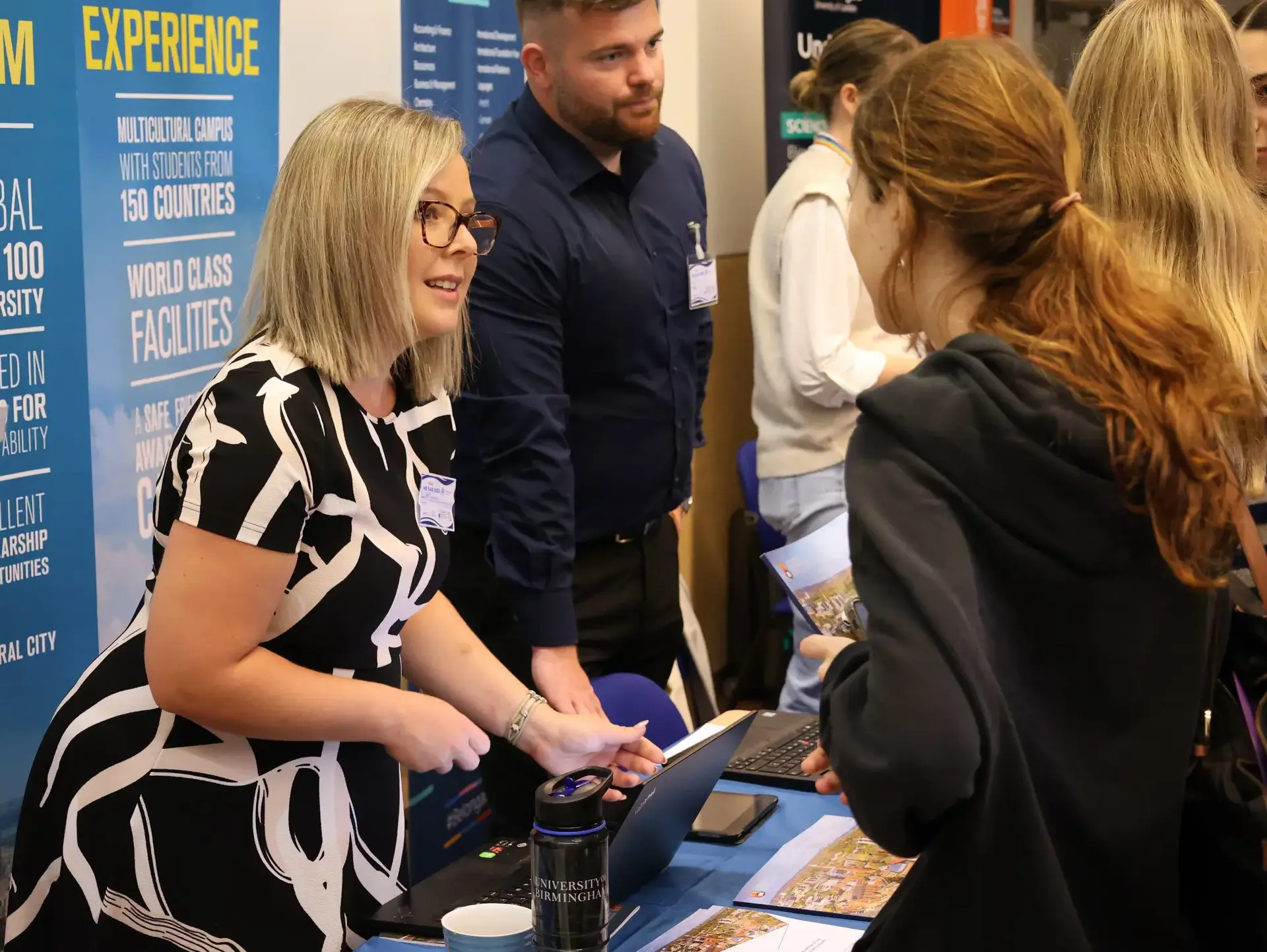 Teachers and students networking at careers fair