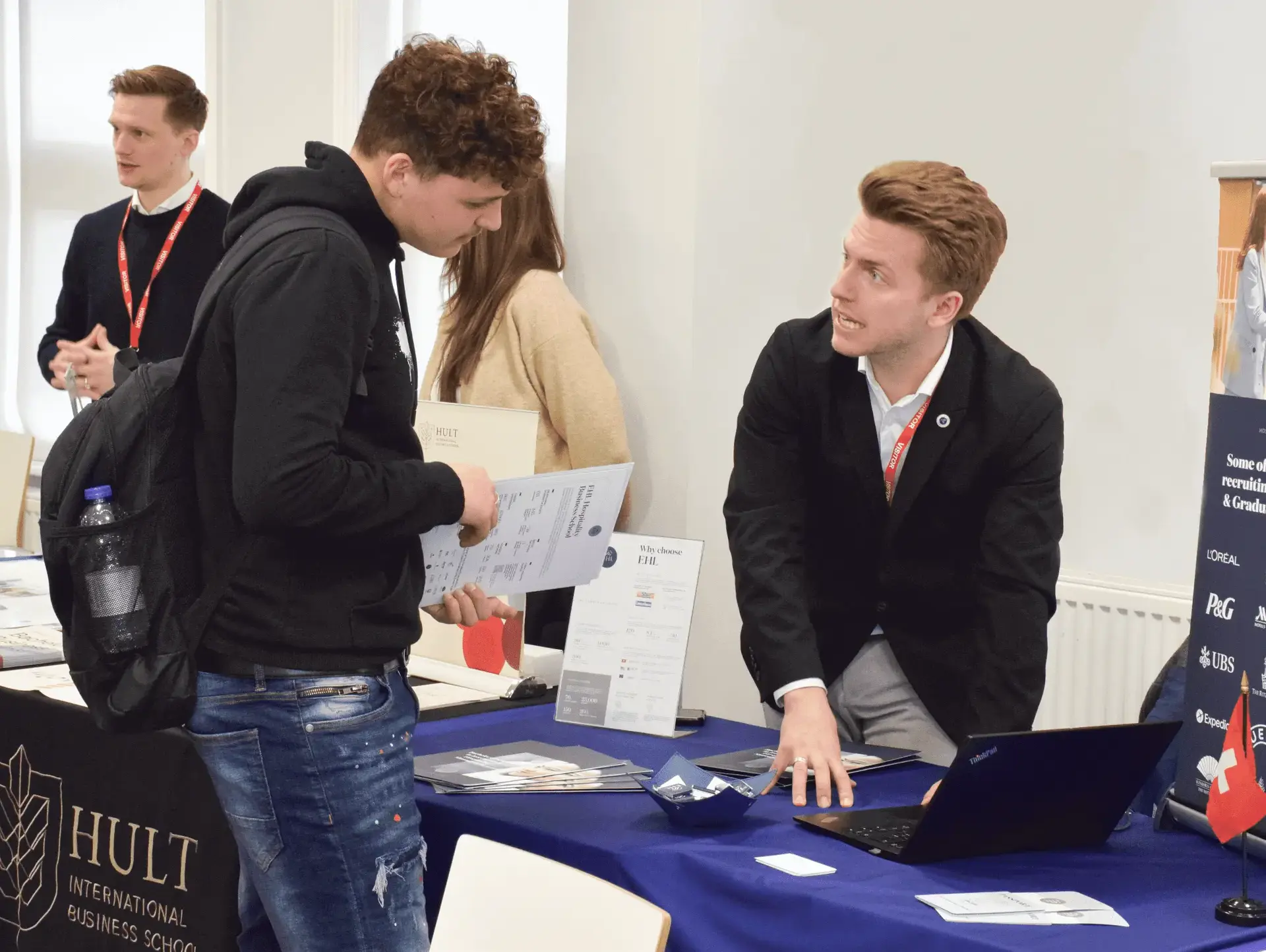 Students and staff networking at careers fair