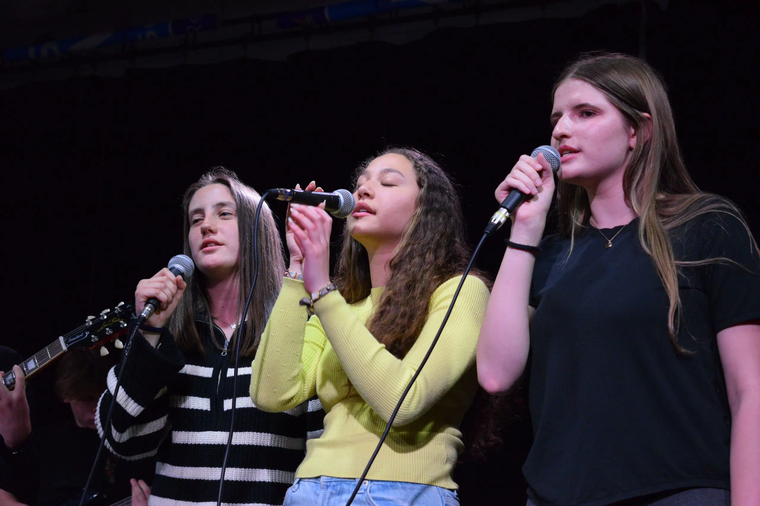 Taisiia singing in music concert
