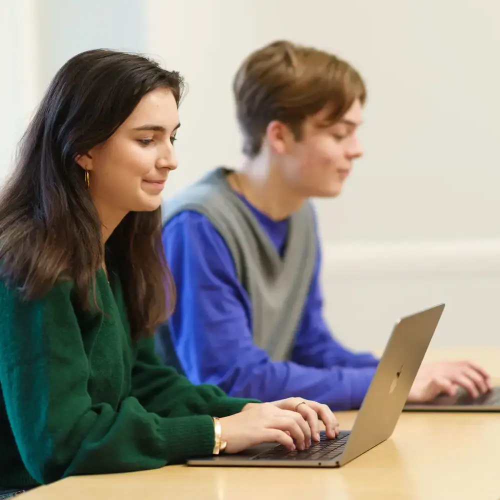 EAS students in class on laptops