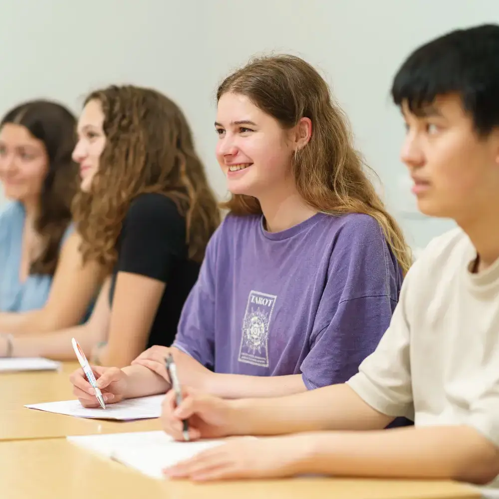 Students listening attentively in class