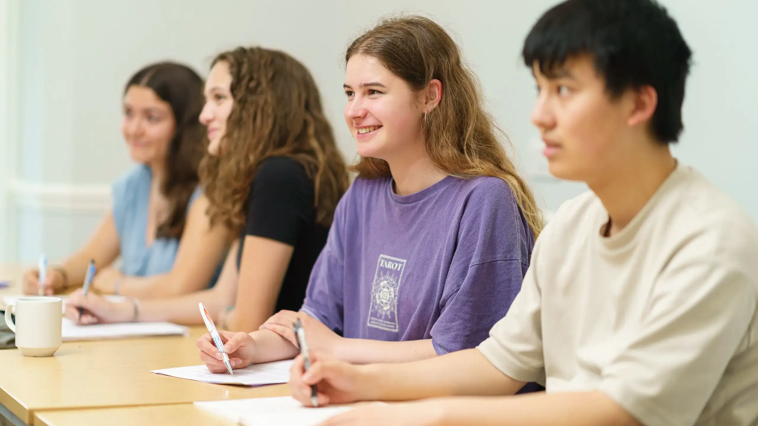 Students looking up from desk