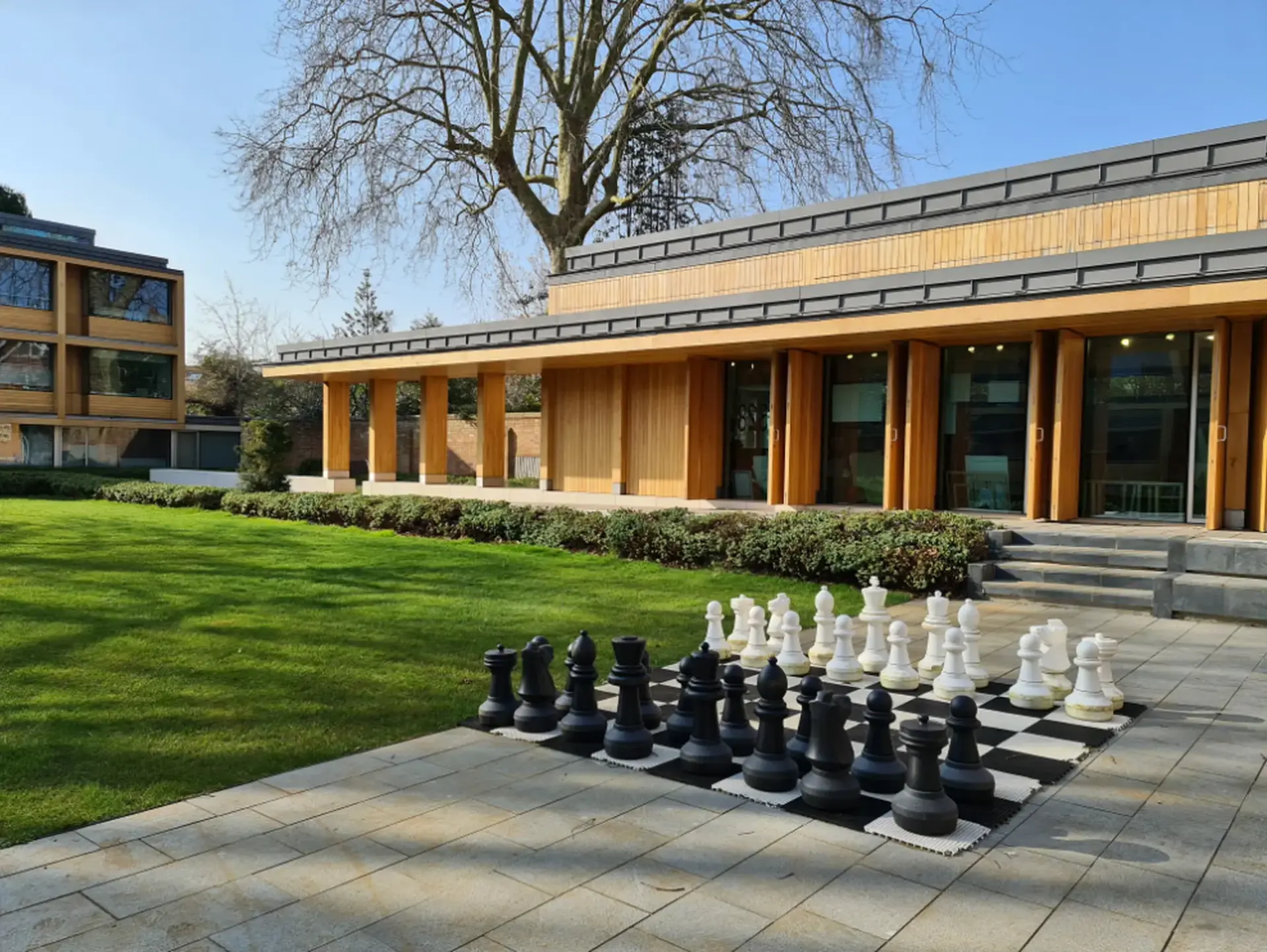 Outdoor chess board set outside of school building