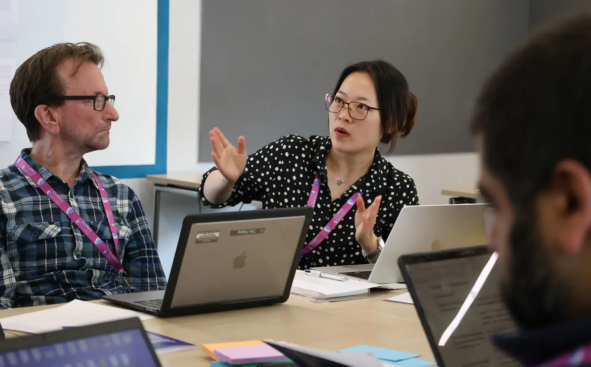 Teachers having discussion in seminar