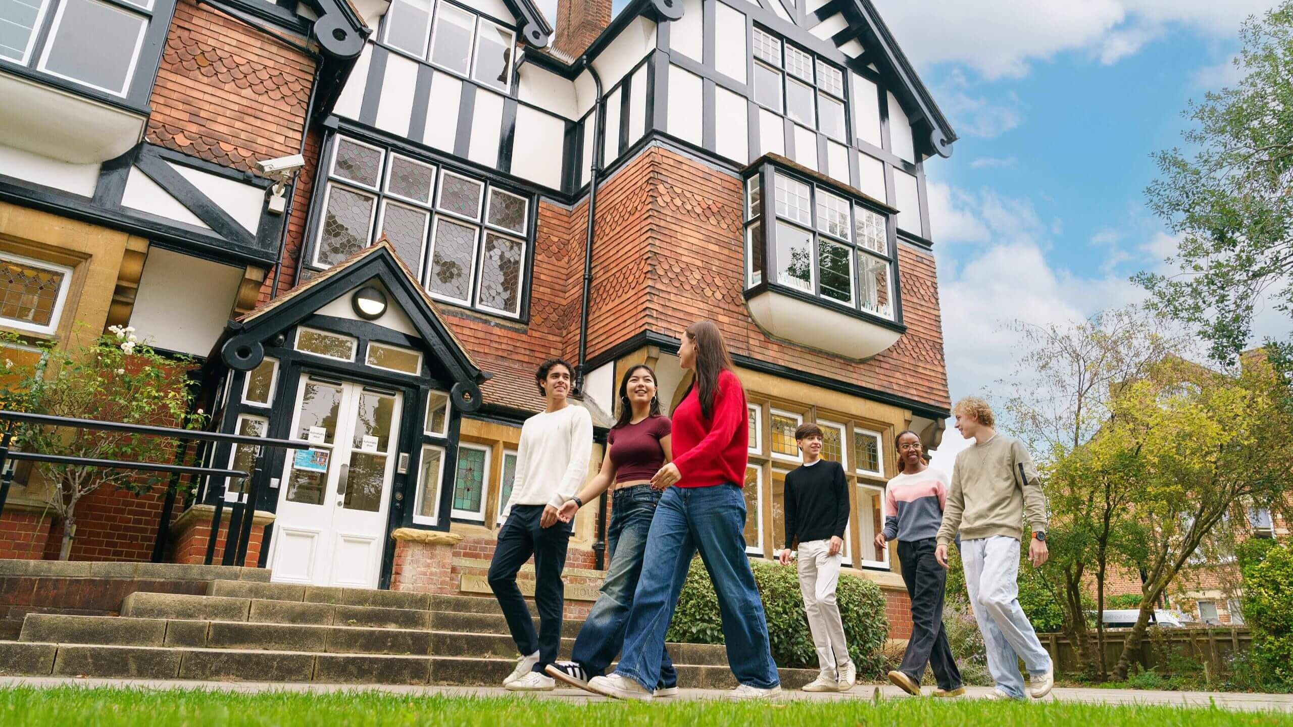 Students walking iutside St Clare's building