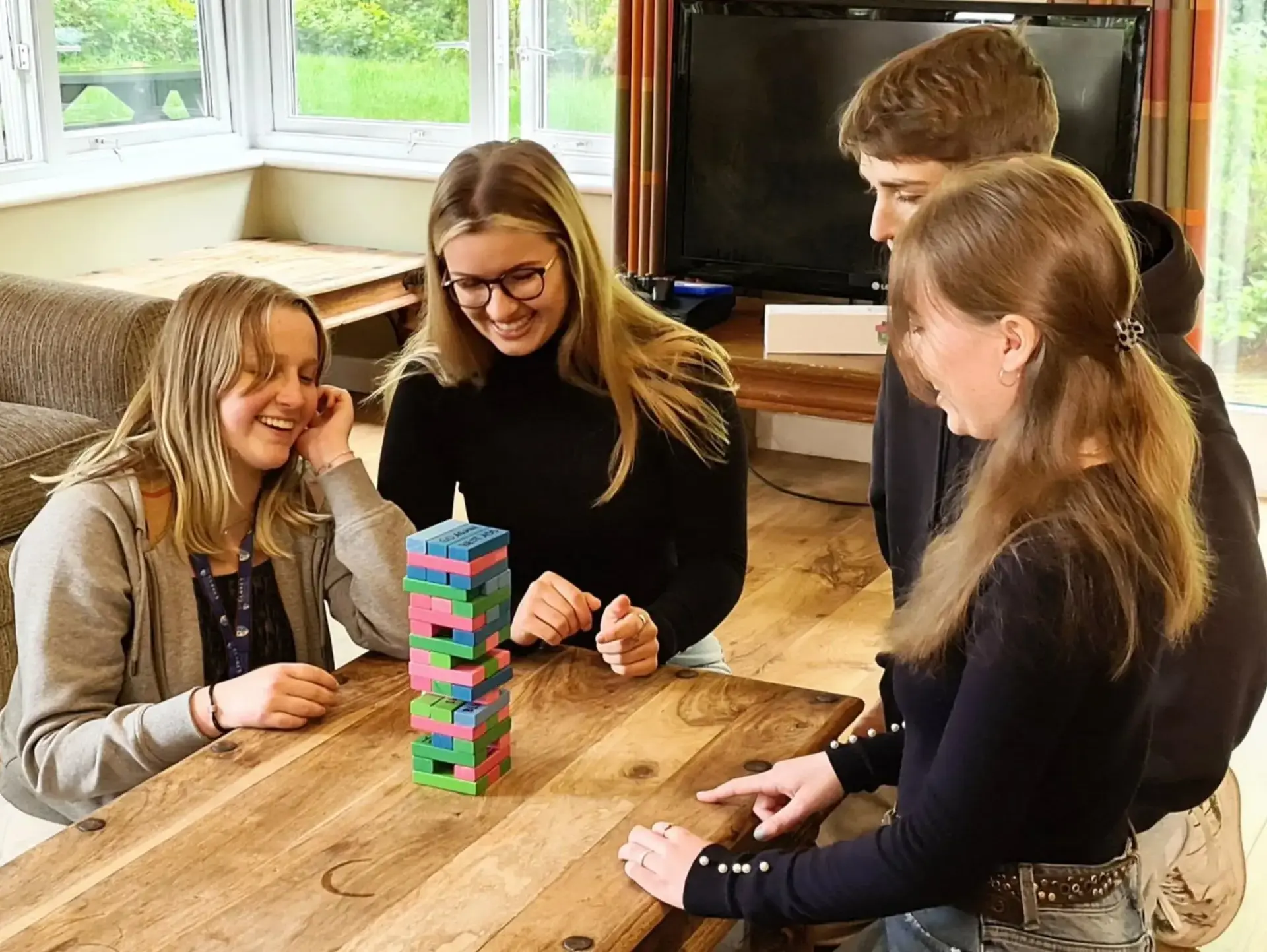 Students playing Jenga