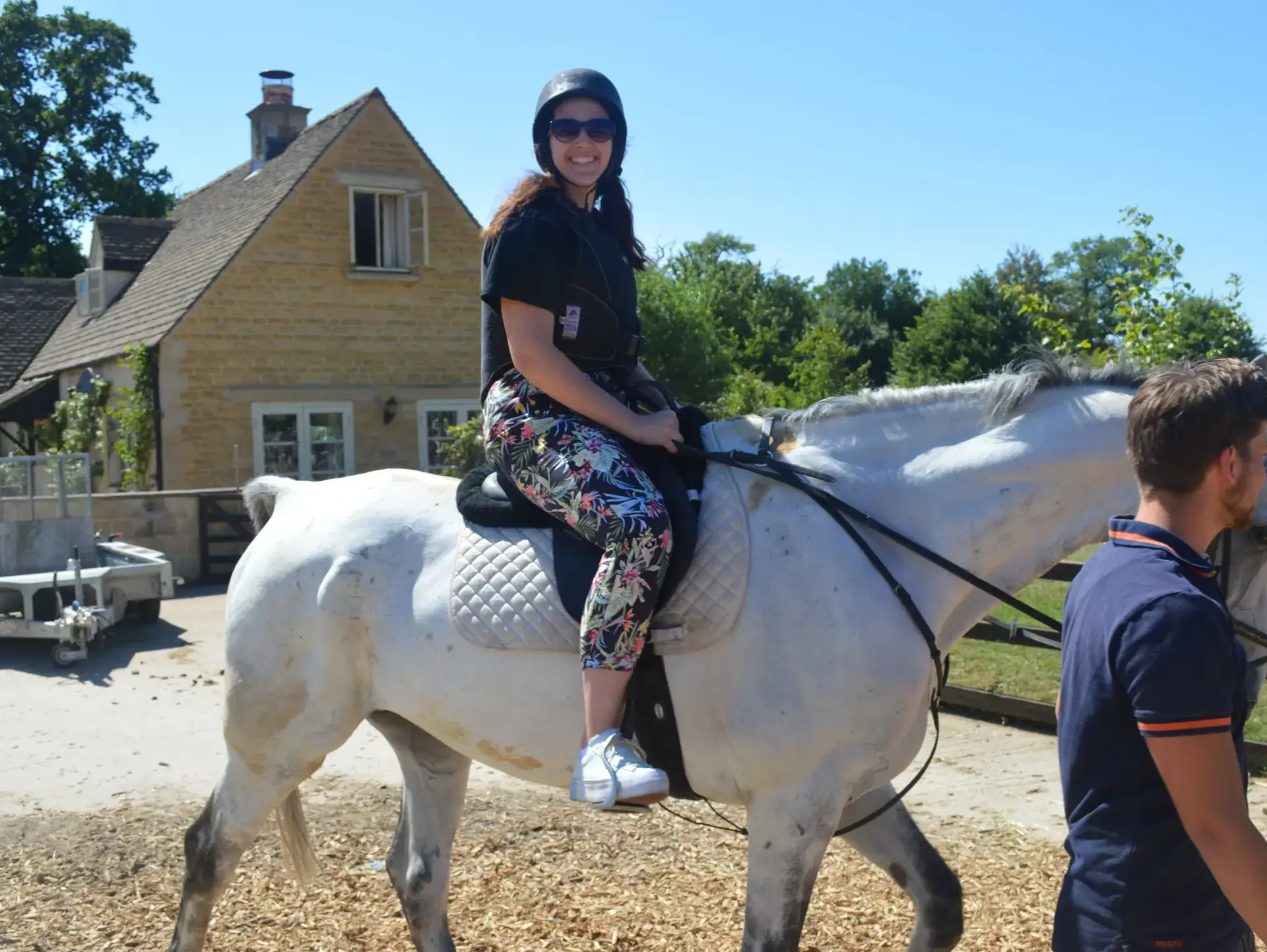 Student riding horse