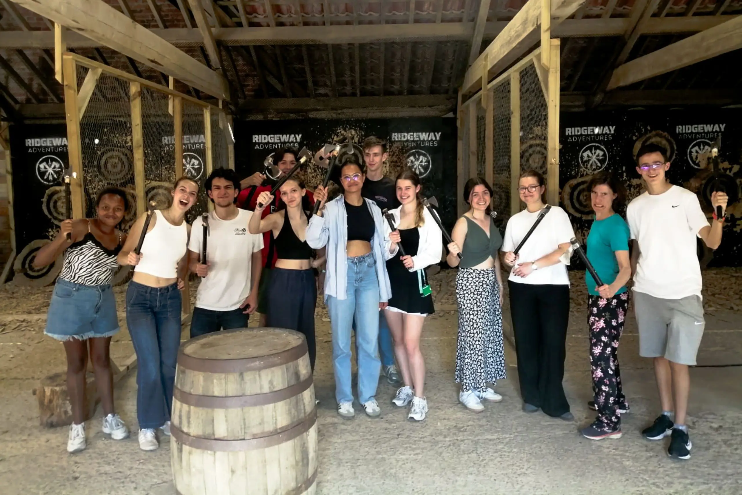 Adriana doing an axe throwing activity