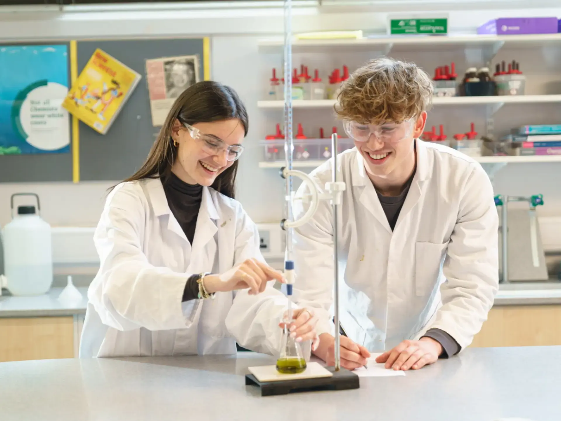 Two students in lab setting
