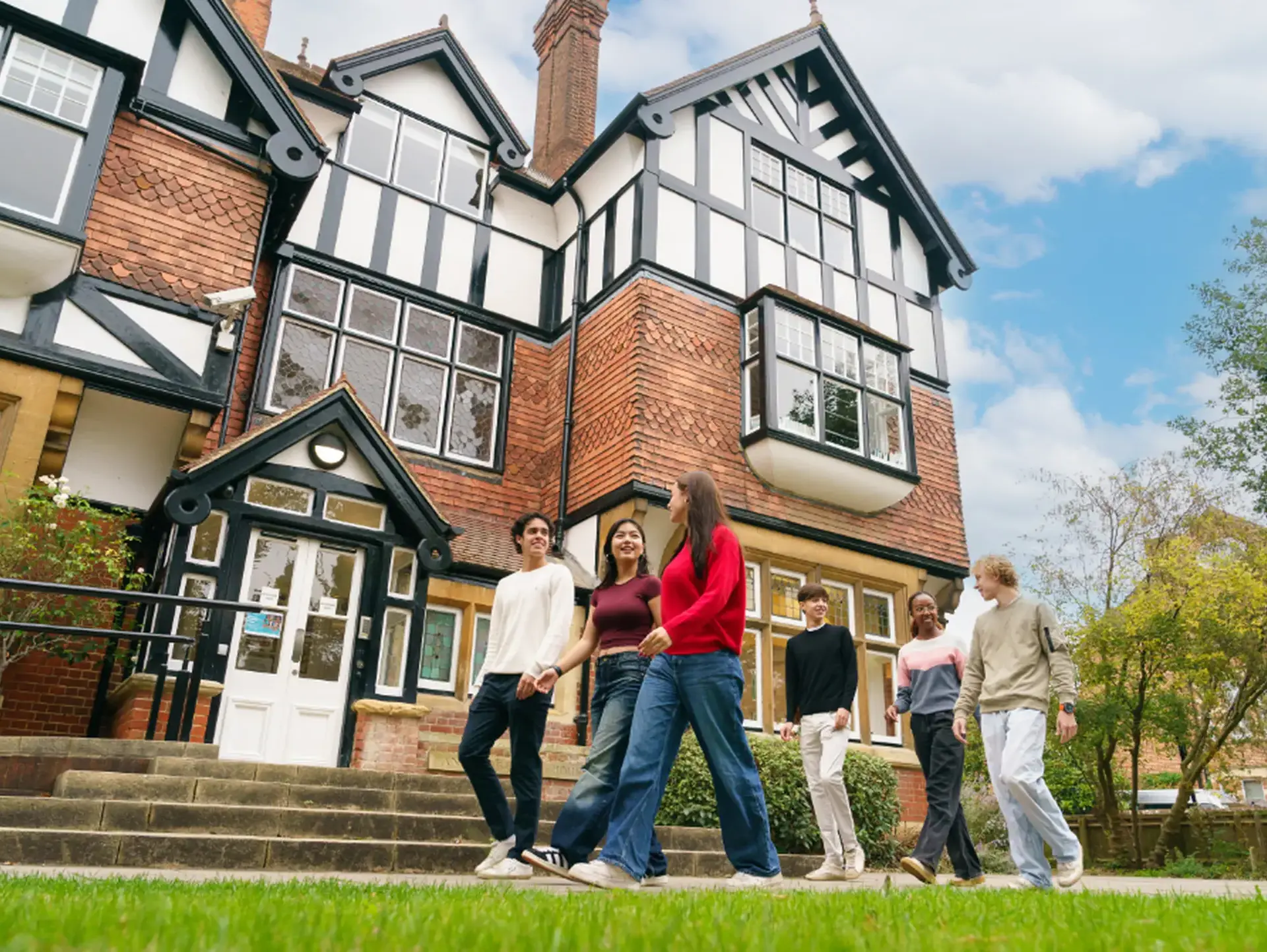 Students walking outside St Clare's building