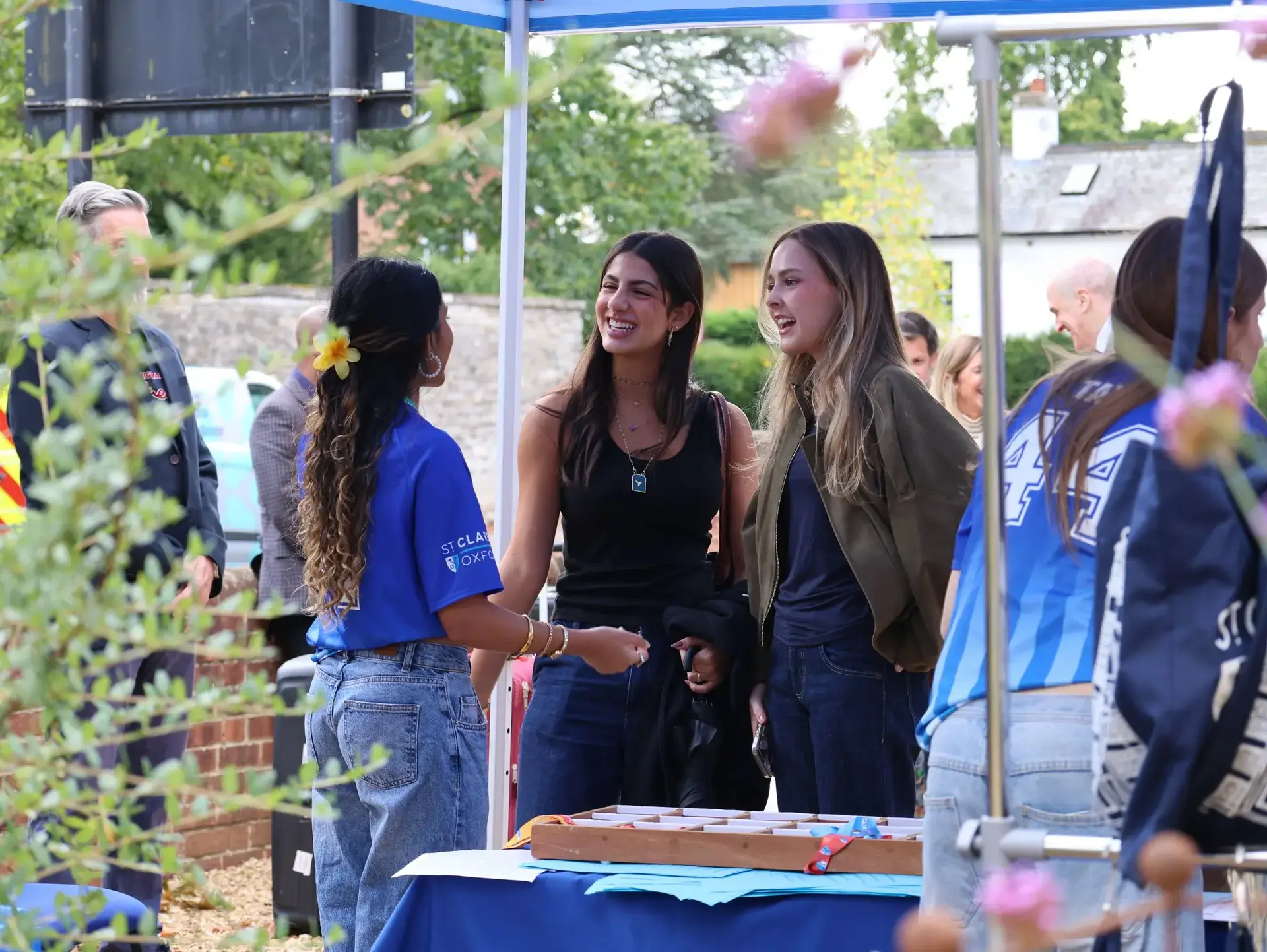 Students chatting at stall