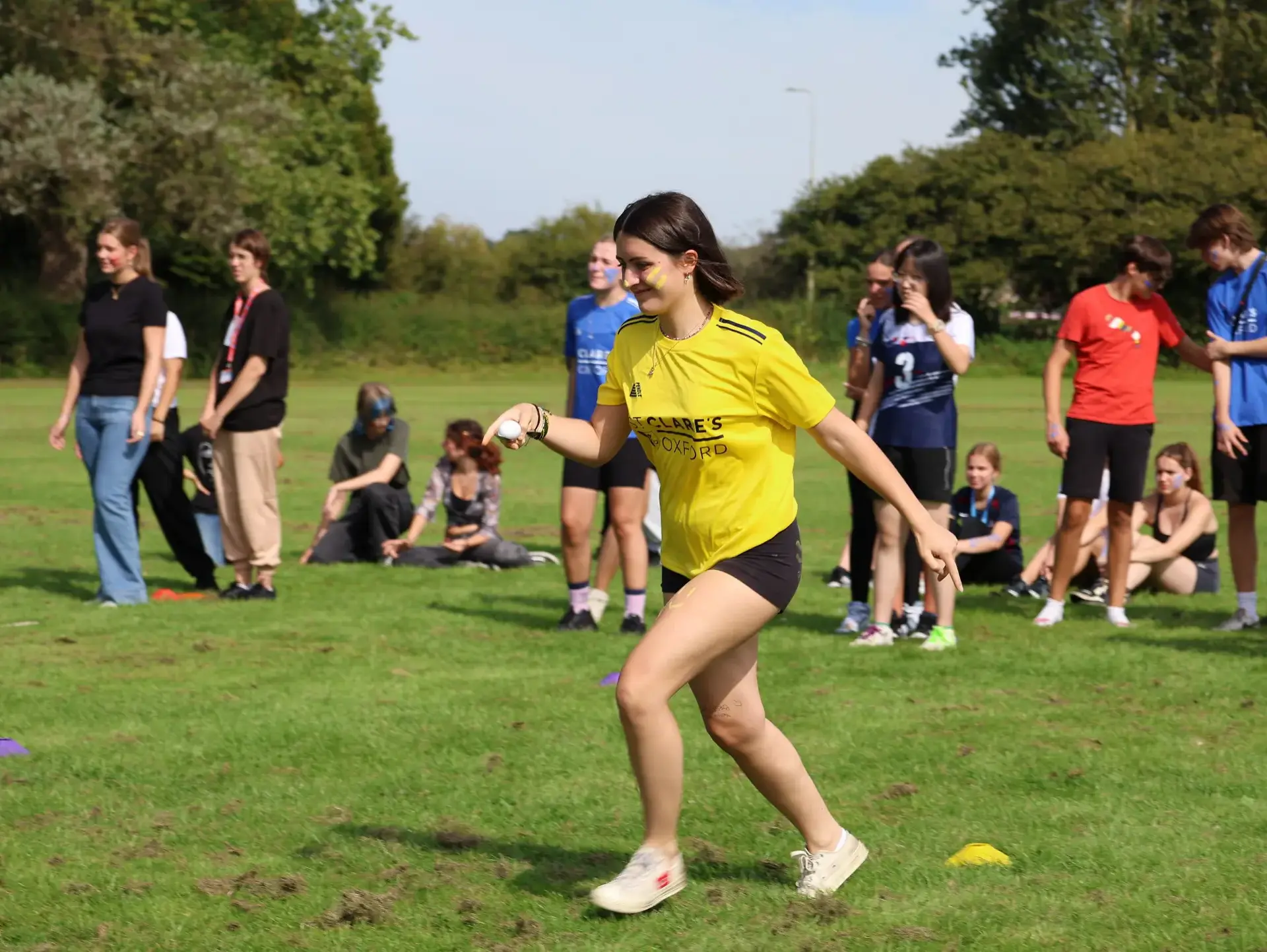 Students participating in egg and spoon race