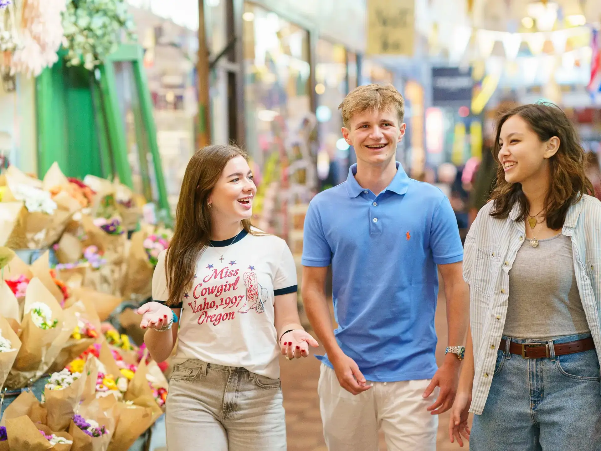 Students walking through covered market