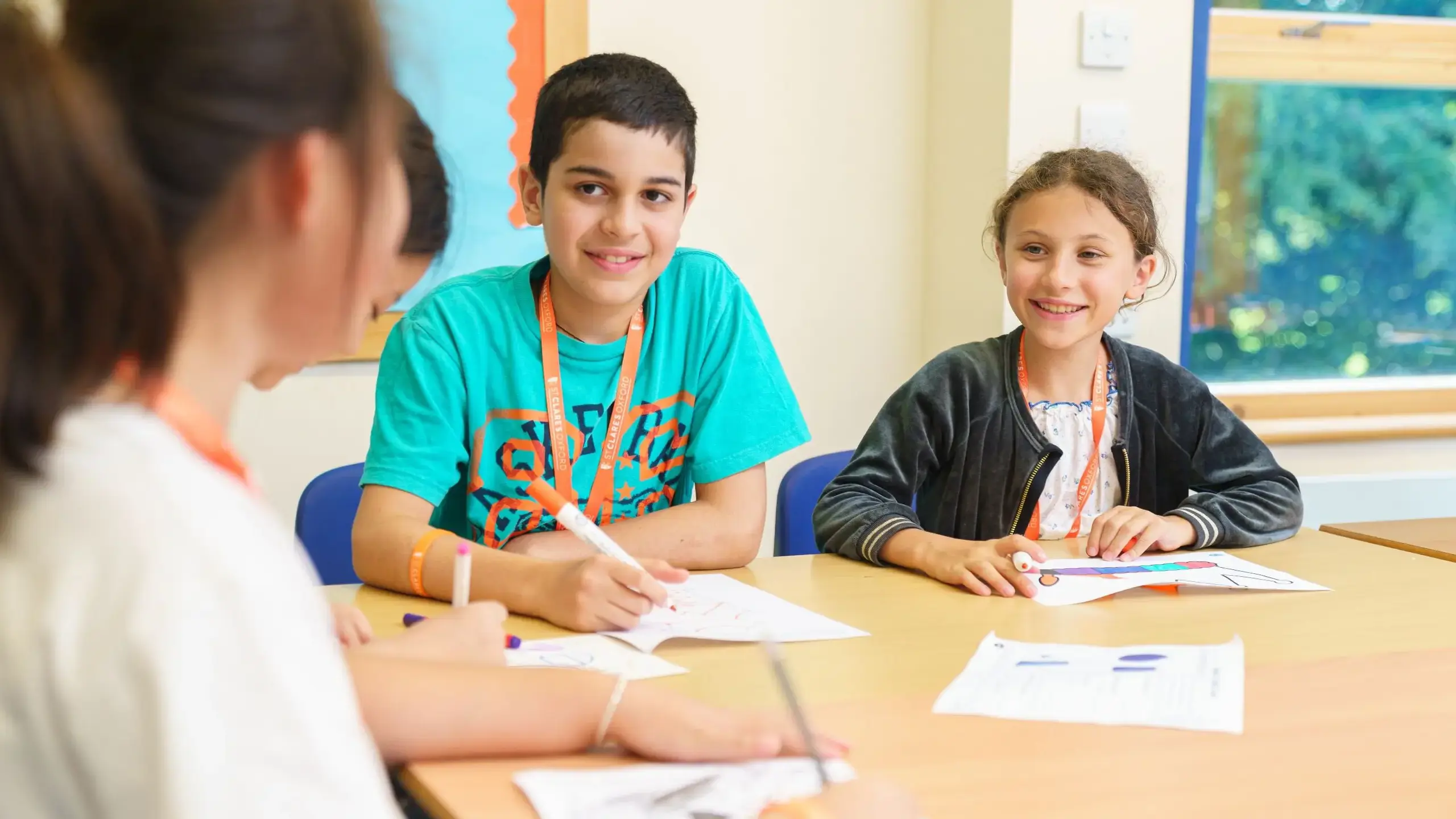 Junior students participating in class