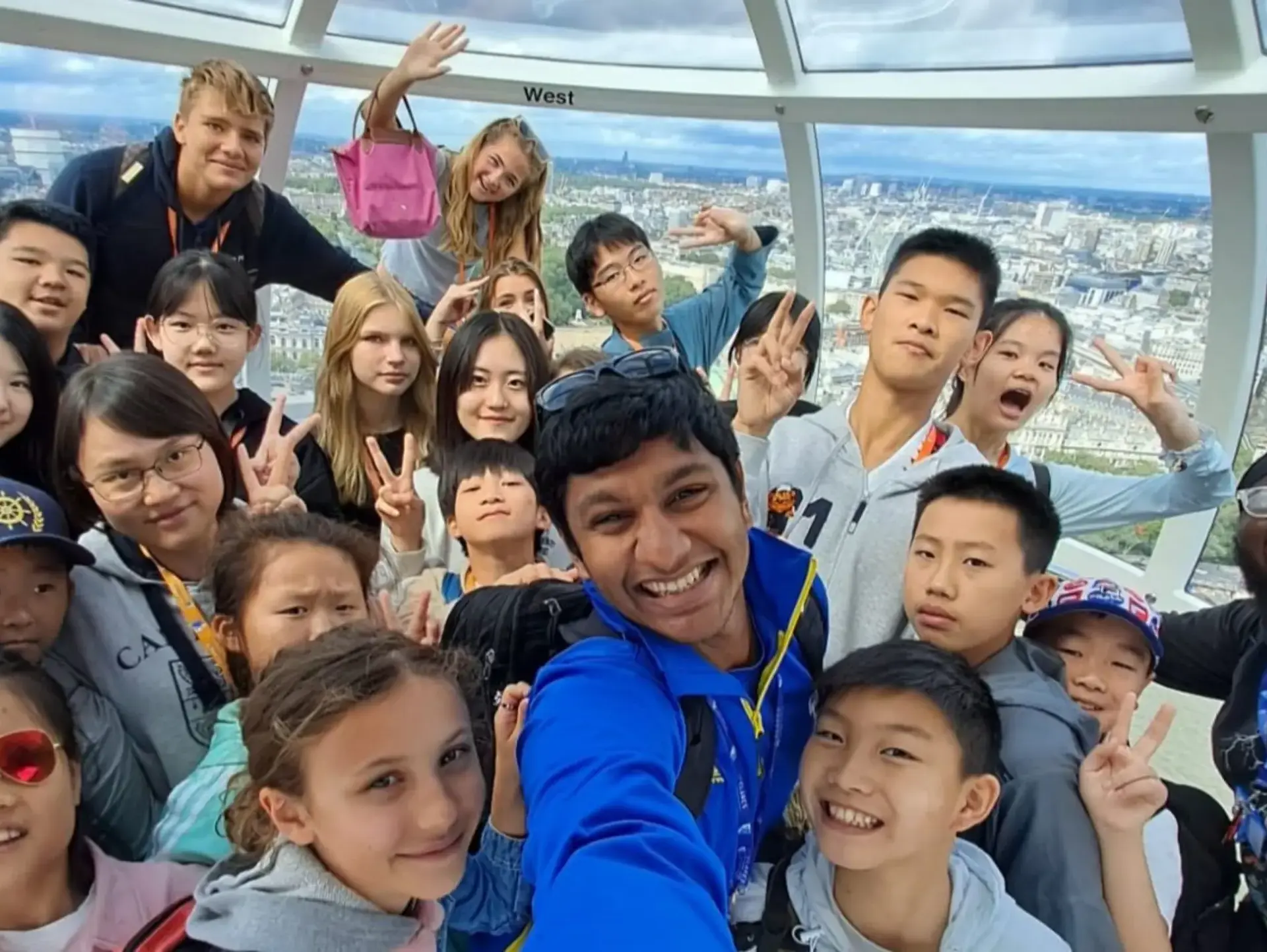 Students posing in pod on the London Eye