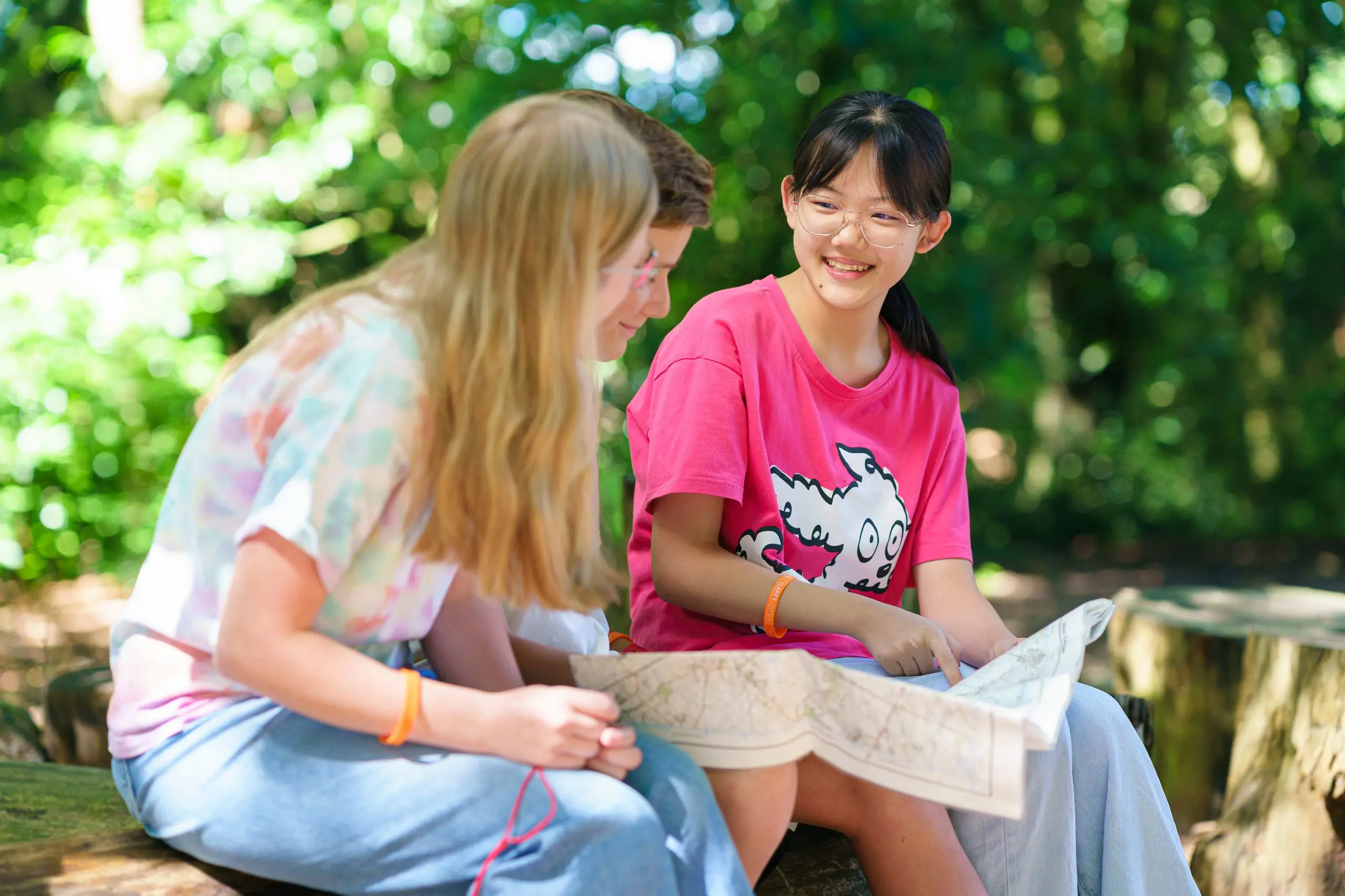 Young leaders student discussing map route together