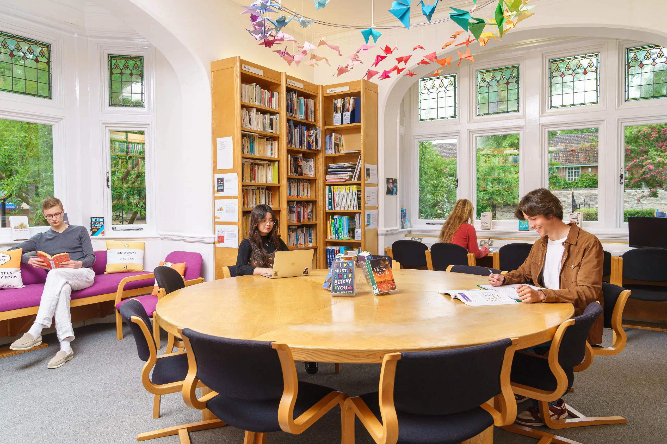 Students working in study area of library