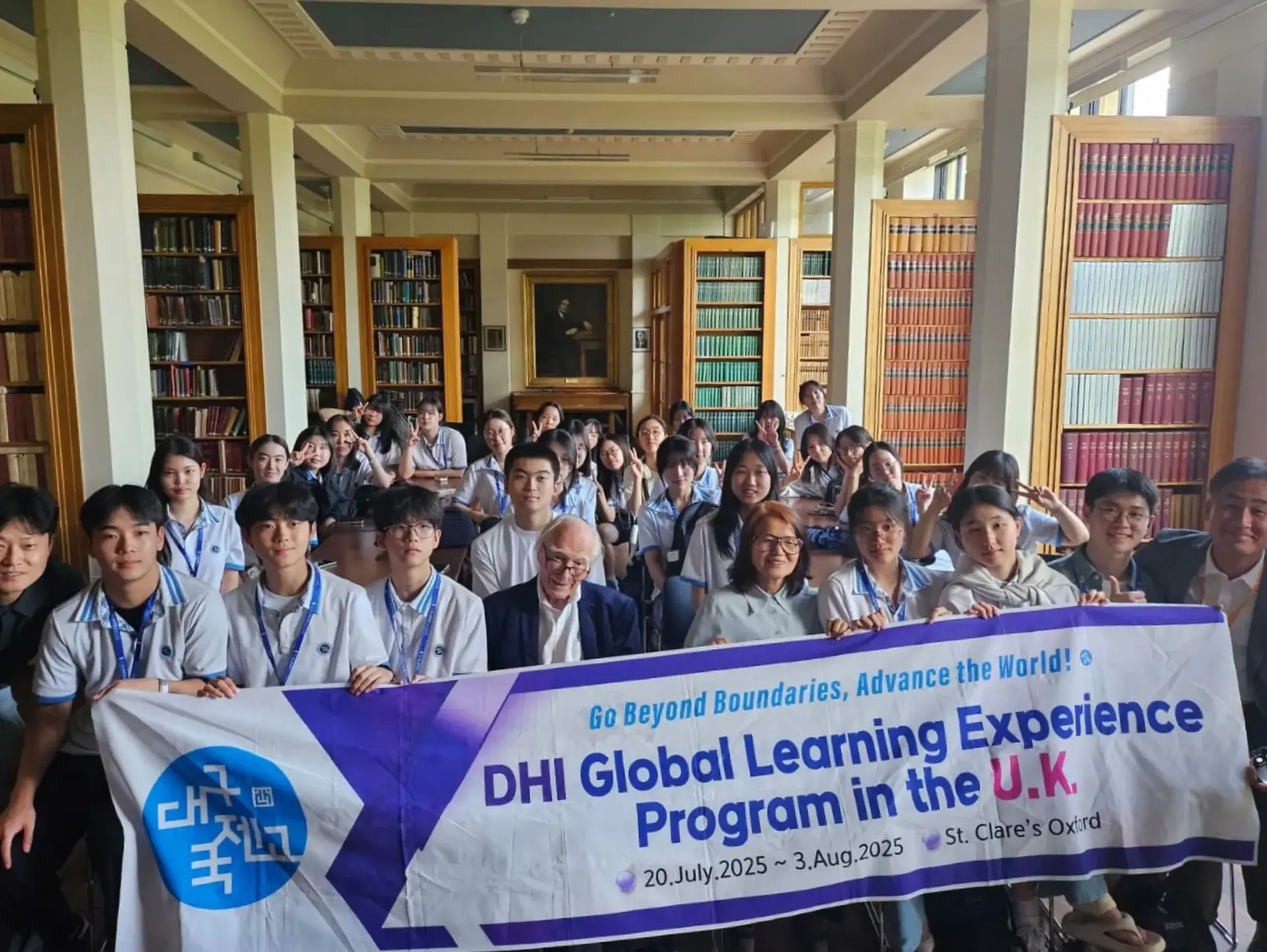 Students holding Global Learning Experience Programme banner