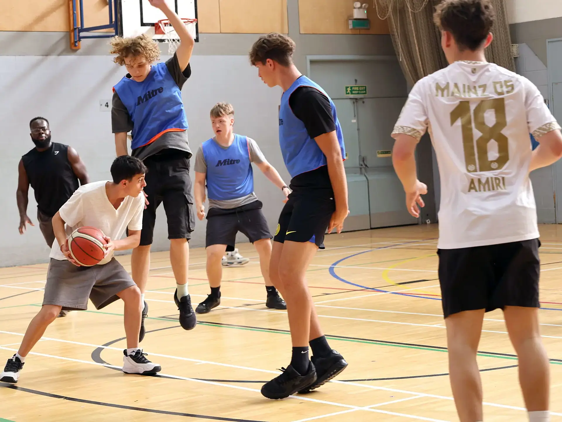 Students playing basketball