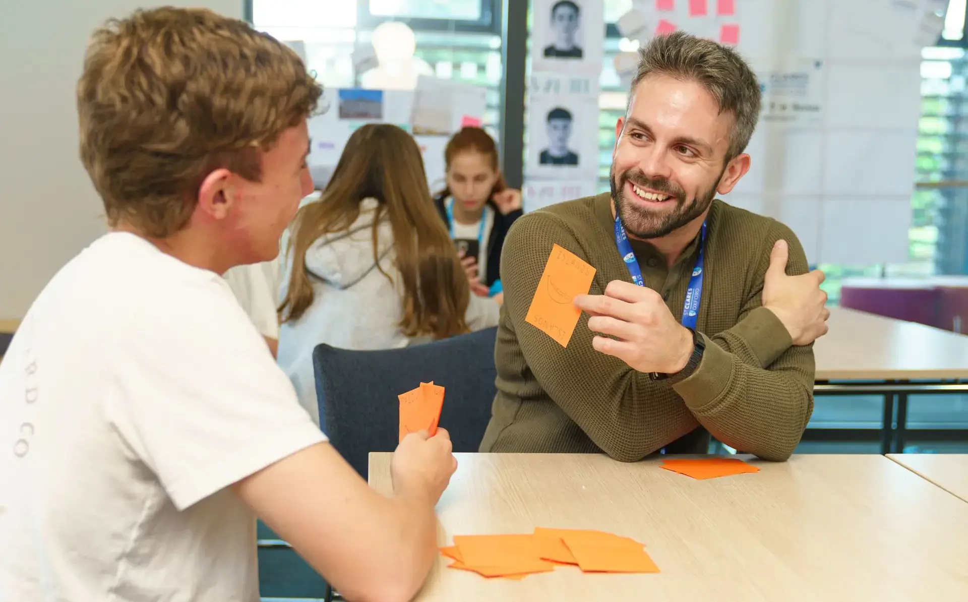 Student and teacher using flash cards