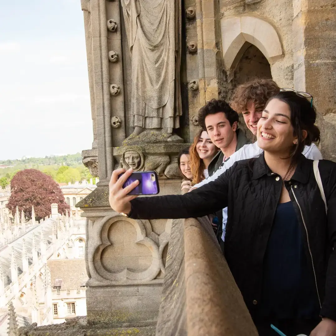 Students taking a selfie at Oxford landmark