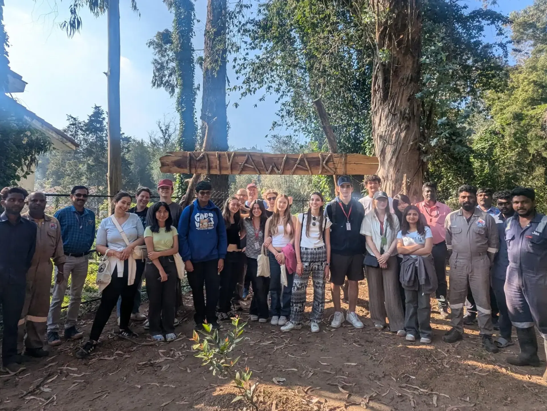 Students posing for group photo outdoors
