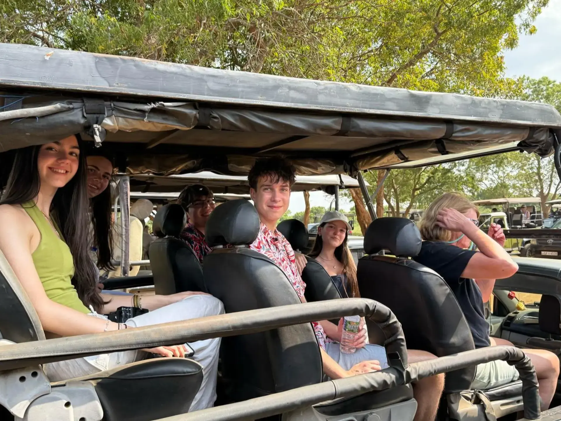 Students looking out from cart