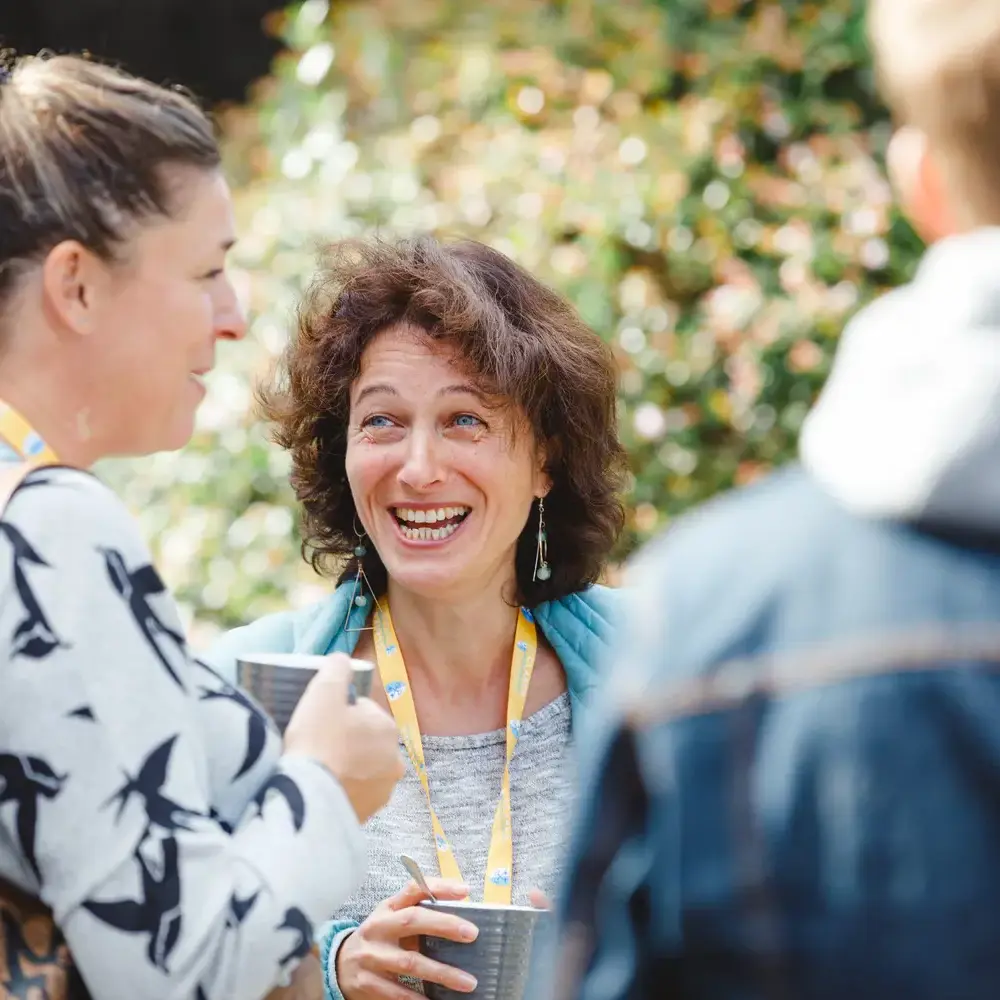 Trainee teachers laughing outdoors