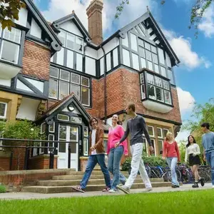 Students exploring historical buildings on campus