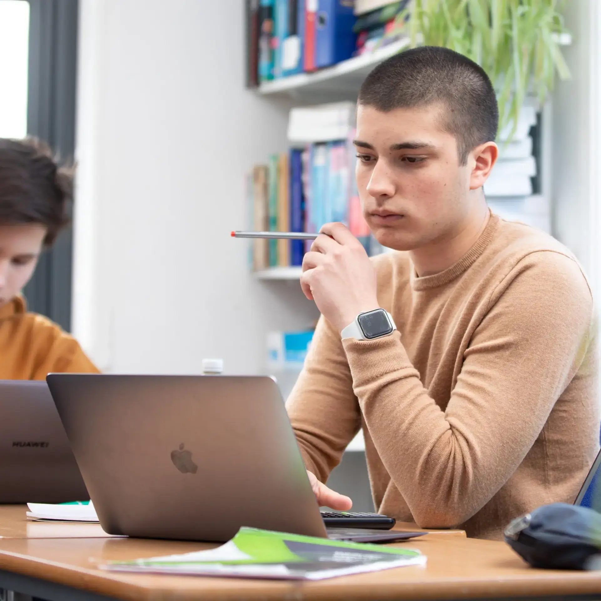 Student working at laptop