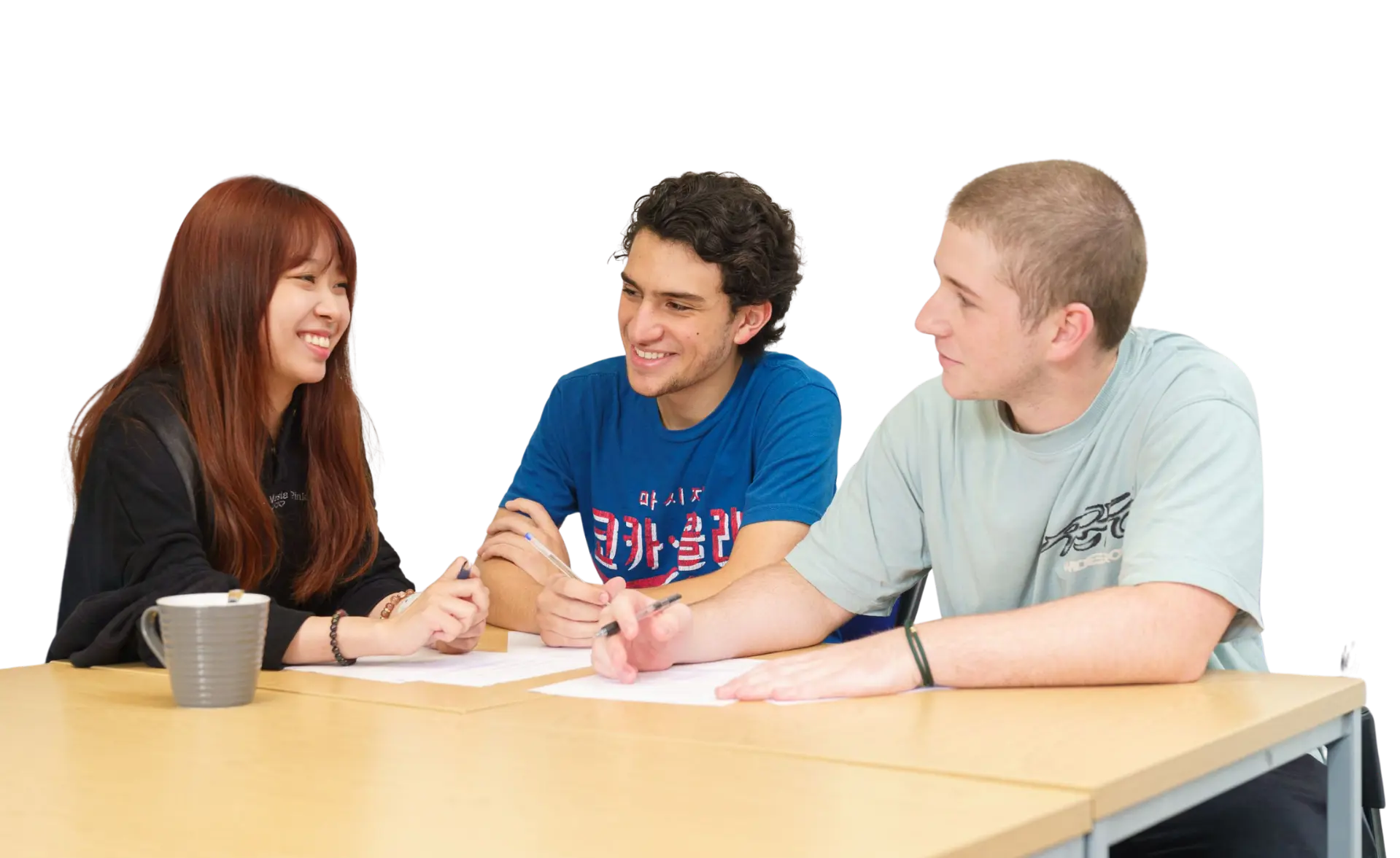 Group of students smiling in classroom