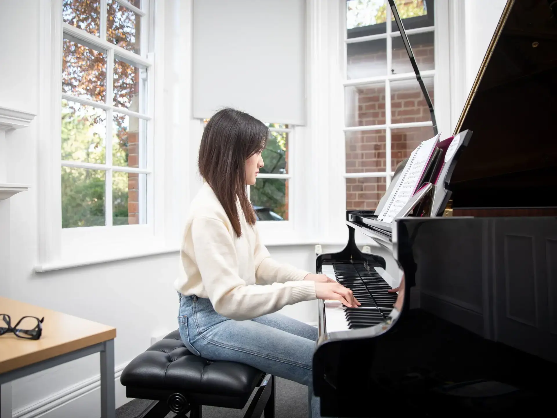 Student playing piano